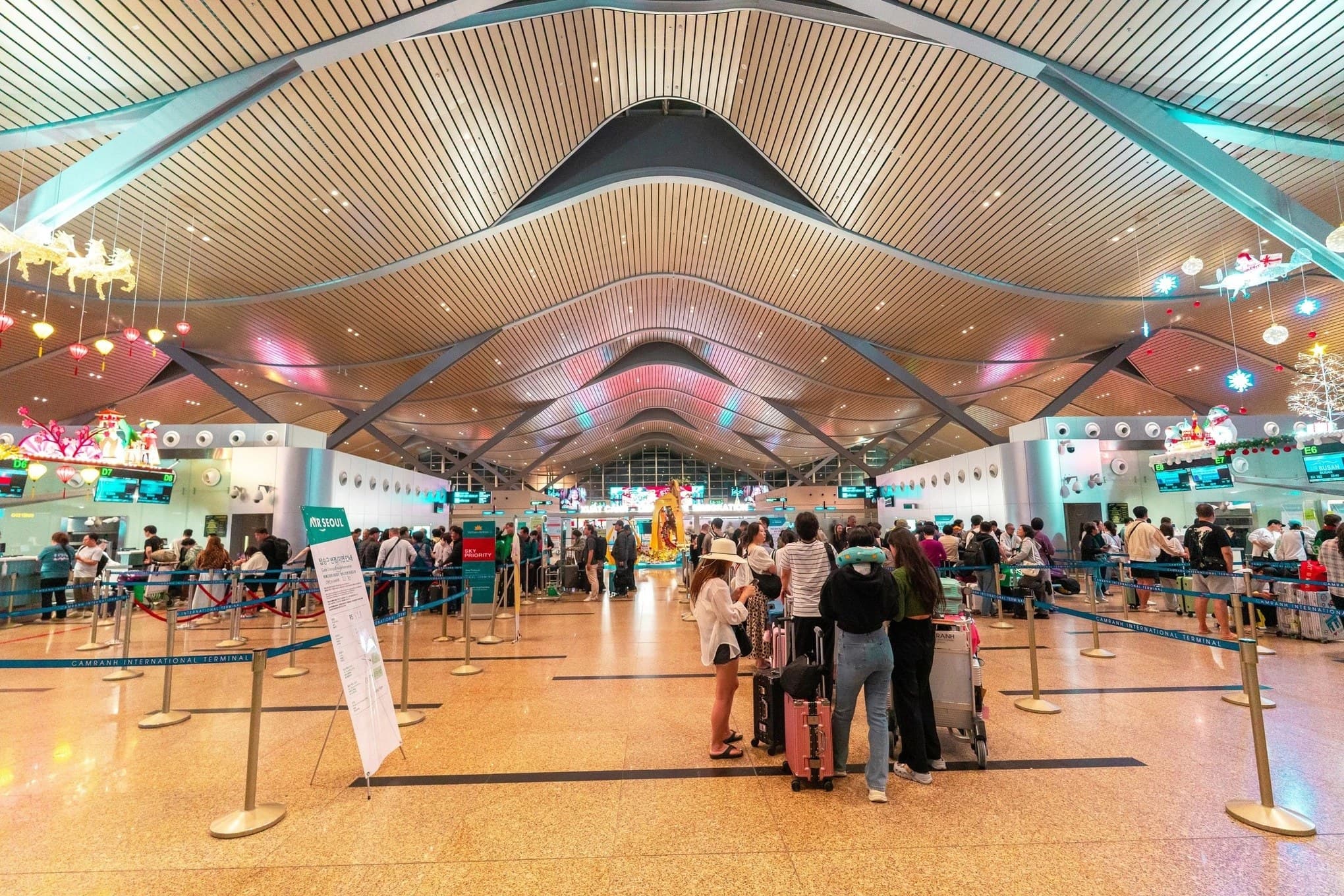Check-in hall at Cam Ranh International Airport with its distinctive wave-patterned ceiling